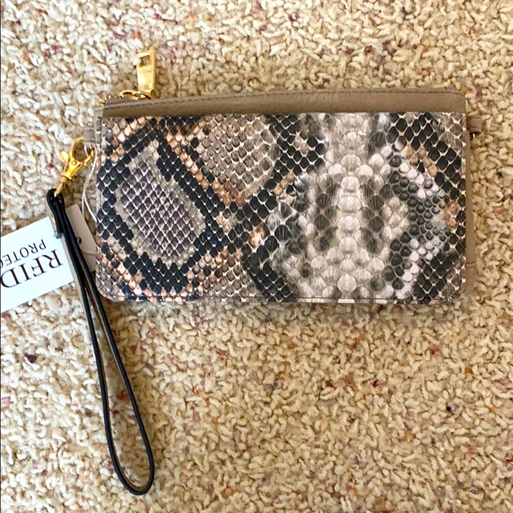 Jen and Co snake skin wristlet